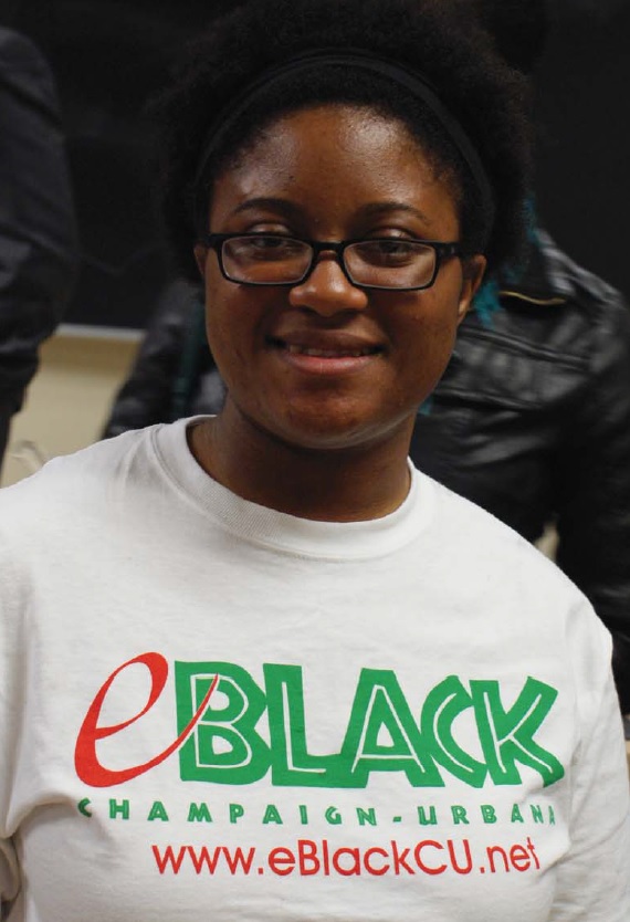 Aaisha at Campus-Community Symposium in eBlackCU T-shirt